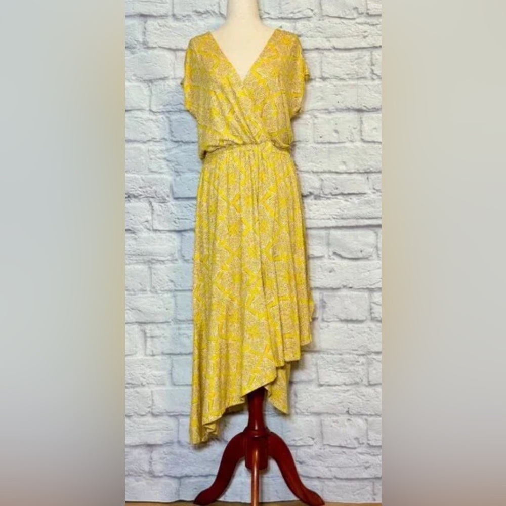 Anthro’s Maeve sunny yellow Midi Dress